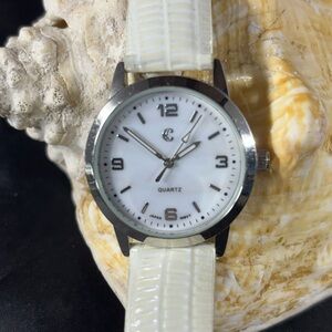 Charming Charlie women’s watch mother-of-pearl face with white band 38mm new bat